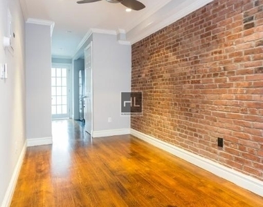 E 6th St. - Photo Thumbnail 1