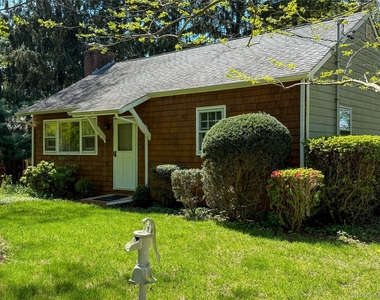 8415 Soundview Avenue - Photo Thumbnail 1