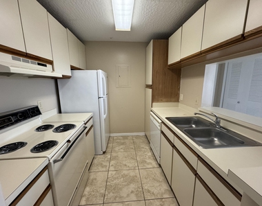 7667 N Wickham Road - Photo Thumbnail 7