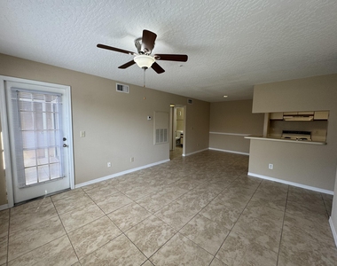 7667 N Wickham Road - Photo Thumbnail 3
