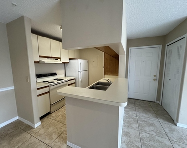 7667 N Wickham Road - Photo Thumbnail 6
