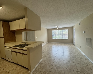 7667 N Wickham Road - Photo Thumbnail 4