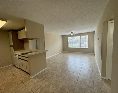 7667 N Wickham Road - Photo Thumbnail 2