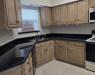 5976 Woodway Place Court - Photo Thumbnail 3