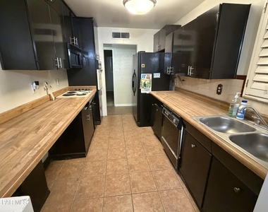8208 Dempsey Avenue - Photo Thumbnail 1