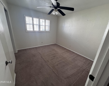 8208 Dempsey Avenue - Photo Thumbnail 3