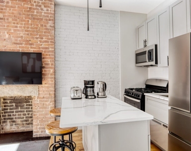 273 W 10th St - Photo Thumbnail 2