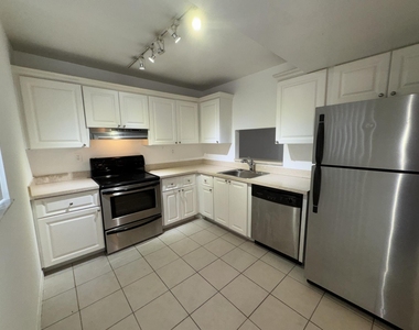 701 N Pine Island Road - Photo Thumbnail 1