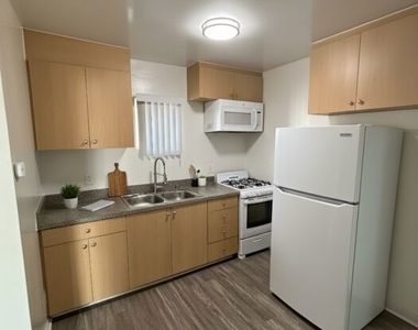 1211 W 28th Street - Photo Thumbnail 2