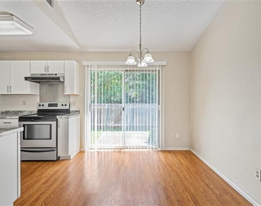 1015 E Yager Ln - Photo Thumbnail 2