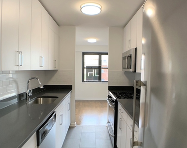 E 16 St - Photo Thumbnail 4
