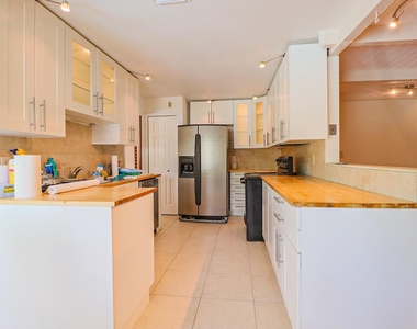 1329 Nw 84th Drive Nw - Photo Thumbnail 3