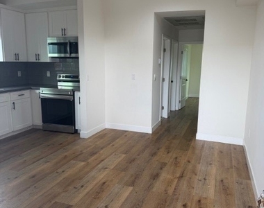 5875 S Towne Avenue - Photo Thumbnail 2