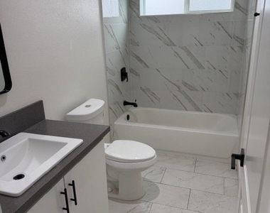 5875 S Towne Avenue - Photo Thumbnail 4