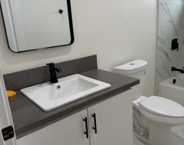 5875 S Towne Avenue - Photo Thumbnail 5