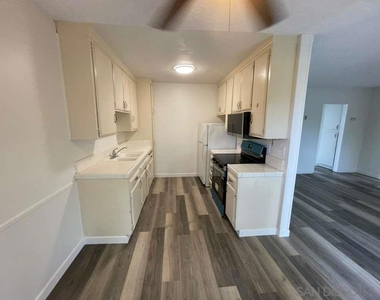 1259 E Ohio Ave - Photo Thumbnail 6