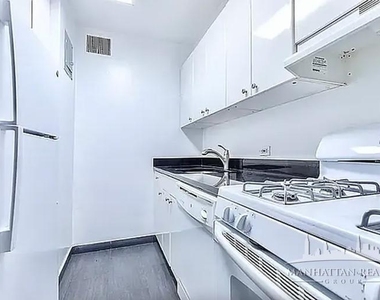 E 46th St - Photo Thumbnail 2