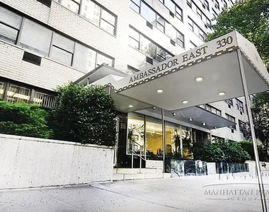 E 46th St - Photo Thumbnail 4