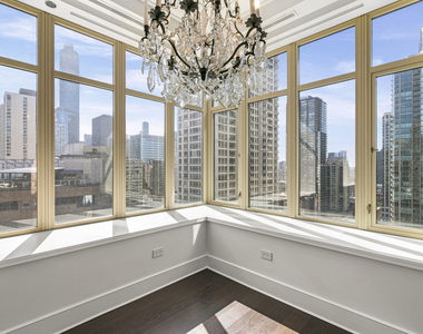 118 E Erie Street - Photo Thumbnail 3