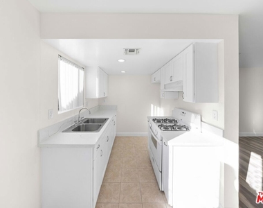 14112 Delano Street - Photo Thumbnail 2