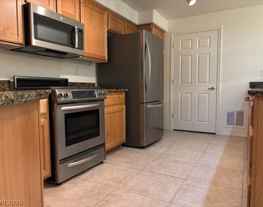 8777 W Maule Avenue - Photo Thumbnail 8