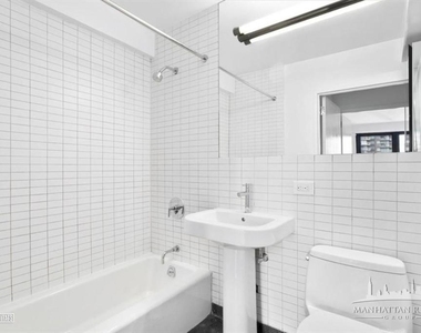E 39th St - Photo Thumbnail 5