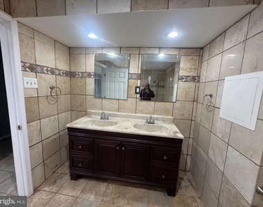 9211 Utica Place - Photo Thumbnail 5