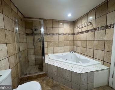 9211 Utica Place - Photo Thumbnail 4