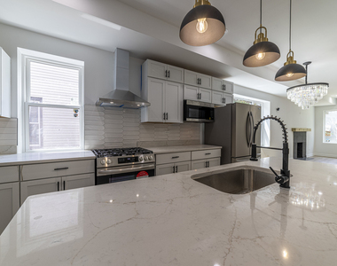 6911 S Kimbark Avenue - Photo Thumbnail 5