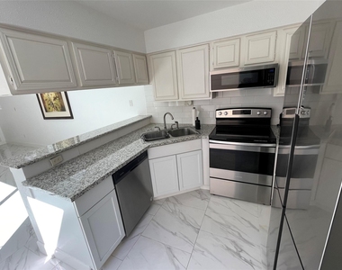 12255 W Village Drive - Photo Thumbnail 11