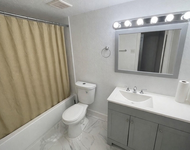 12255 W Village Drive - Photo Thumbnail 5