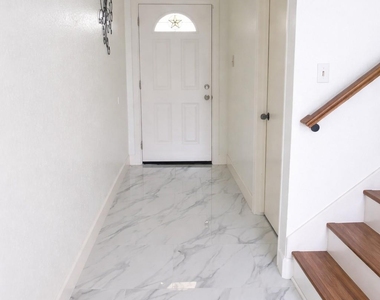 12255 W Village Drive - Photo Thumbnail 2