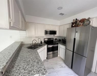 12255 W Village Drive - Photo Thumbnail 10