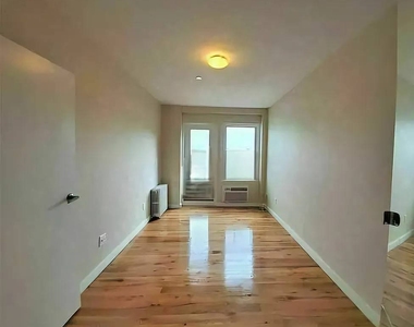 211 61st Street - Photo Thumbnail 8