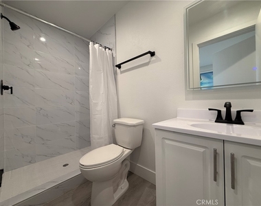 1596 W 36th - Photo Thumbnail 5