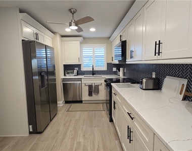 12945 Vanderbilt Drive - Photo Thumbnail 15