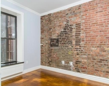 E 13th St. - Photo Thumbnail 4
