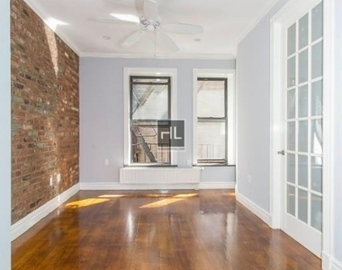 E 13th St. - Photo Thumbnail 3