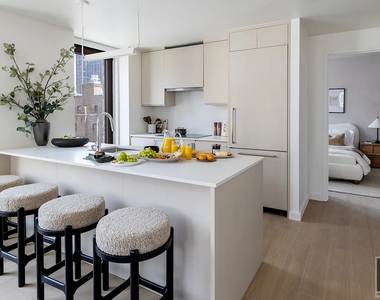 East 50 Street - Photo Thumbnail 6
