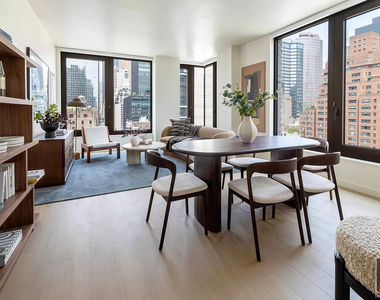 East 50 Street - Photo Thumbnail 5