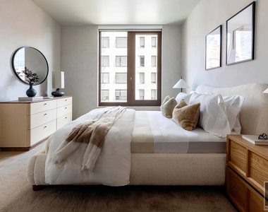 East 50 Street - Photo Thumbnail 2