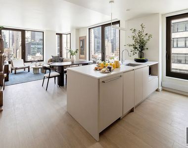 East 50 Street - Photo Thumbnail 9