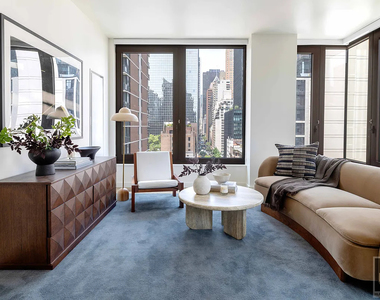 East 50 Street - Photo Thumbnail 1
