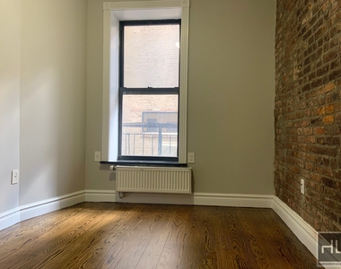 E 13th St. - Photo Thumbnail 5