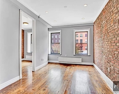 E 13th St. - Photo Thumbnail 3