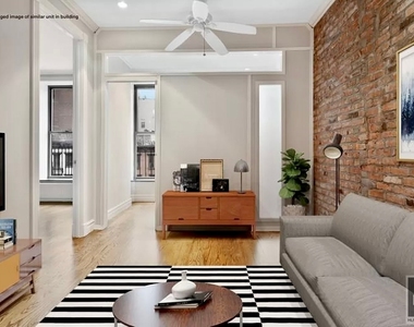 E 13th St. - Photo Thumbnail 4