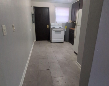 1145 W 25th Street - Photo Thumbnail 1