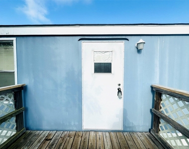 9012 Spruce Street - Photo Thumbnail 1