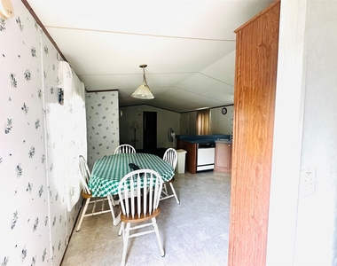 9012 Spruce Street - Photo Thumbnail 2
