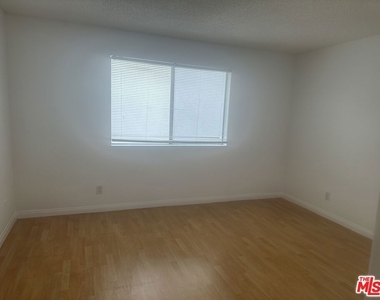 955 S Normandie Avenue - Photo Thumbnail 2
